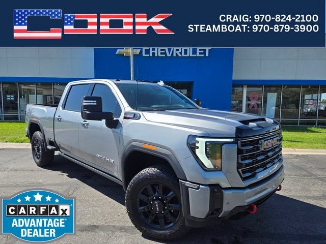 2025 GMC Sierra 3500 HD AT4 in Sterling Metallic — front three-quarter view
