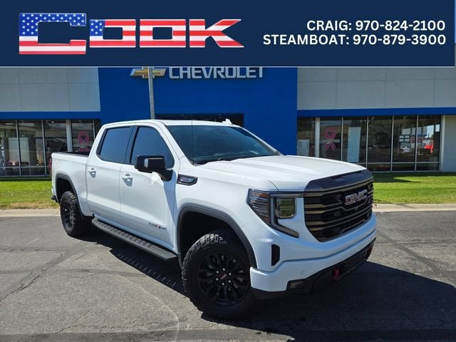 2022 GMC Sierra 1500 AT4X in Summit White — front three-quarter view