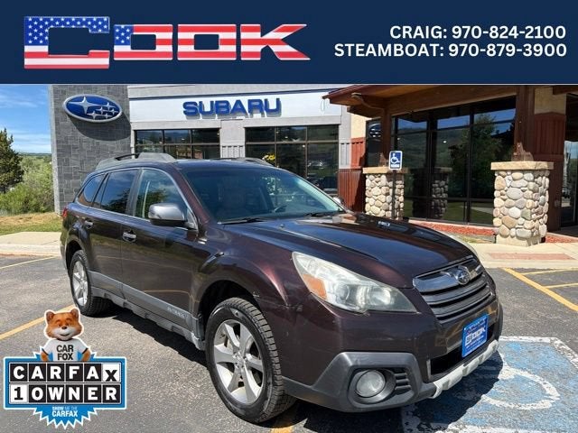 2013 Subaru Outback 3.6R Limited in Purple — front three-quarter view
